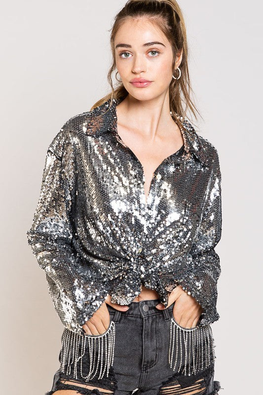 Blusa plateada de lentejuelas