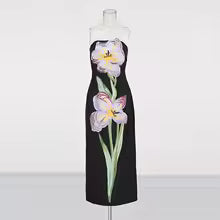 Vestido midi con flor